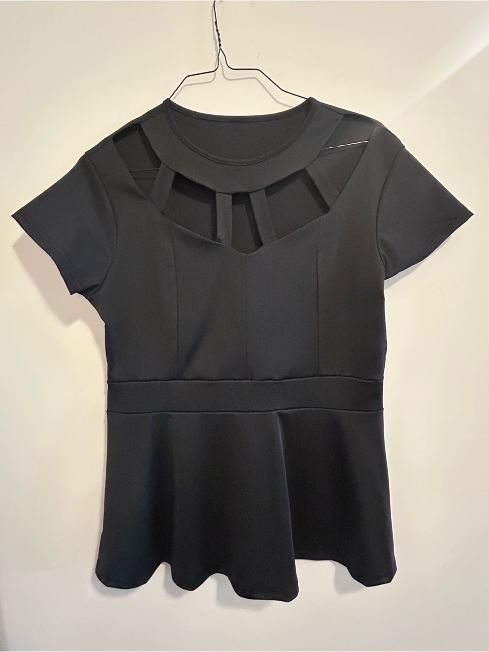 Flattering Black Cutout Peplum Top